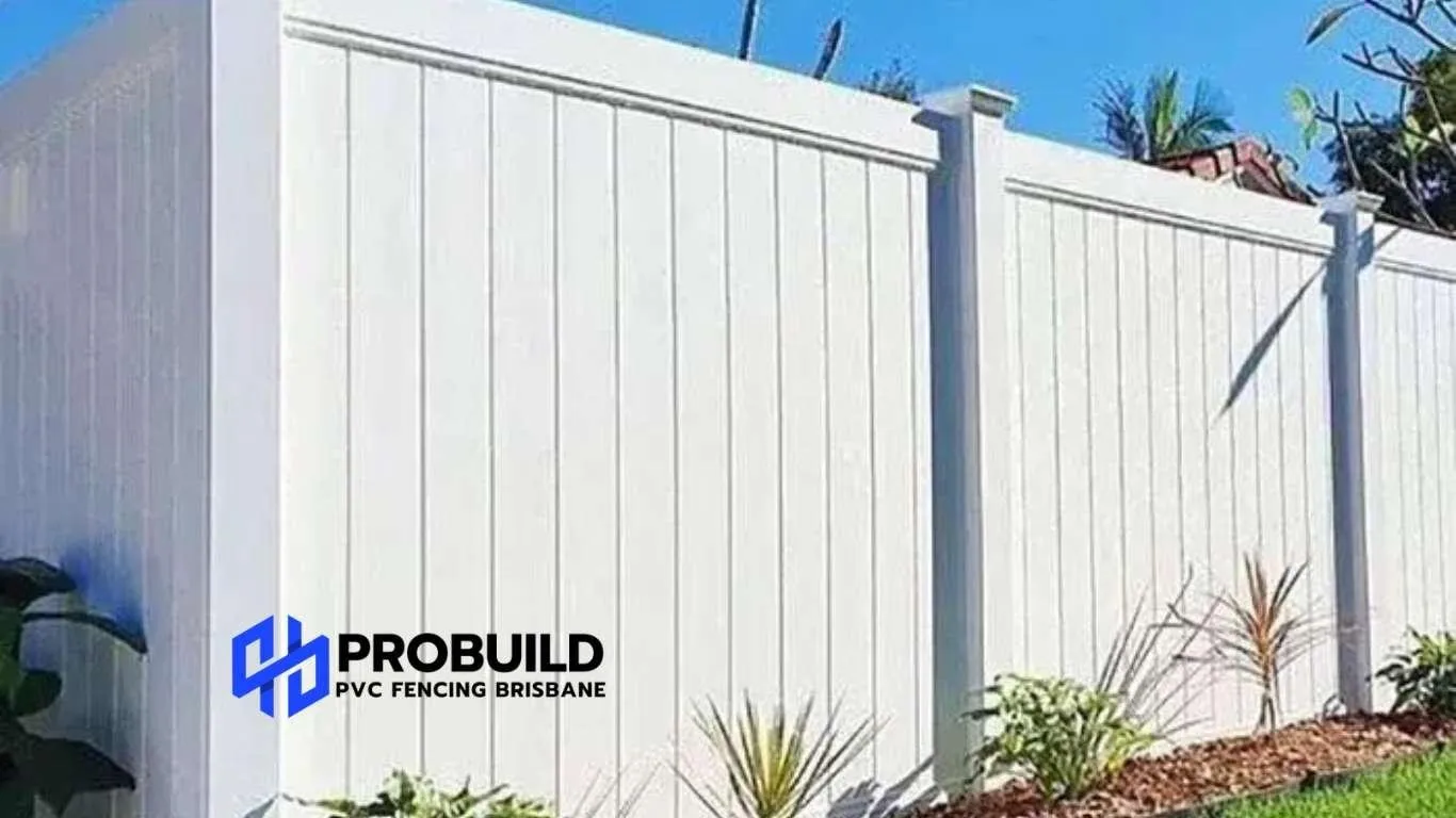 Installed white PVC privacy fence panels